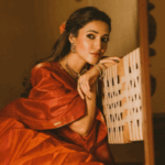 Neha Shetty Stuns in Red Saree for Ugadi